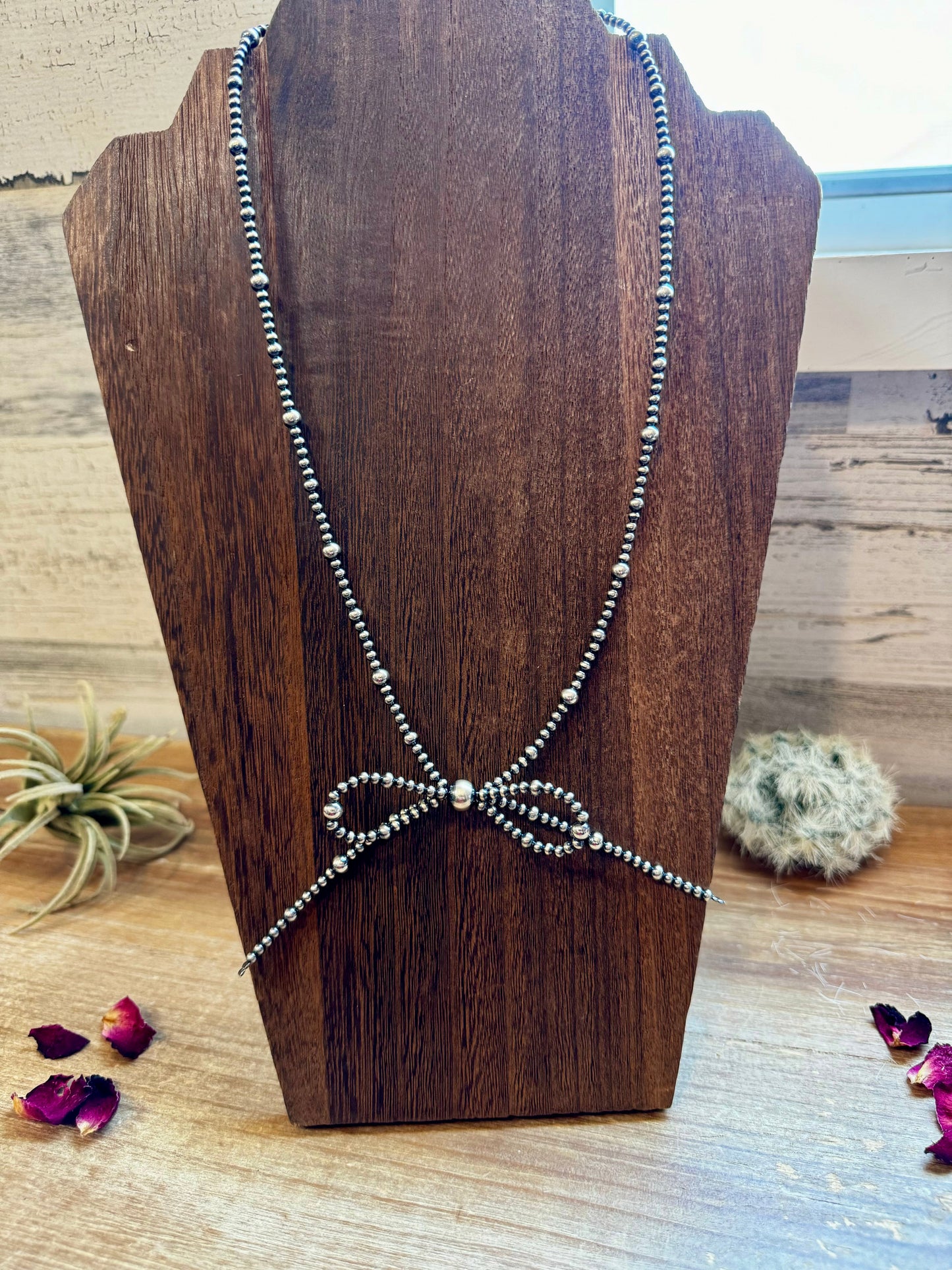 Sterling Silver Pearls Bow Necklace (21")