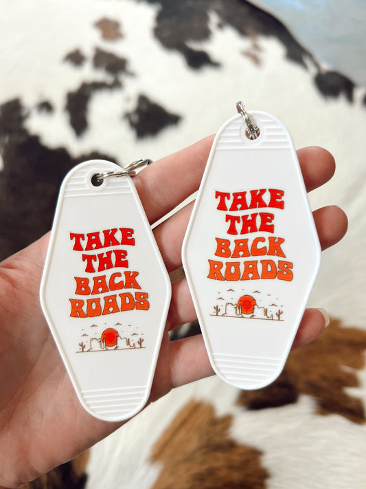 Take The Back Roads Motel Keychain